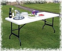 folding fold in half trestle table - ideal for a party - street parties - marquee hirers